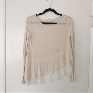 Free People Asymmetrical distressed top